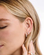 Sami Jewels Bella 3 Stone Huggie Hoops earrings in gold, stacked design with three sparkling stones on each hoop.