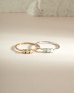 Sami Jewels 3-stone opal ring featuring gold and sterling silver band with vibrant opal gemstones.