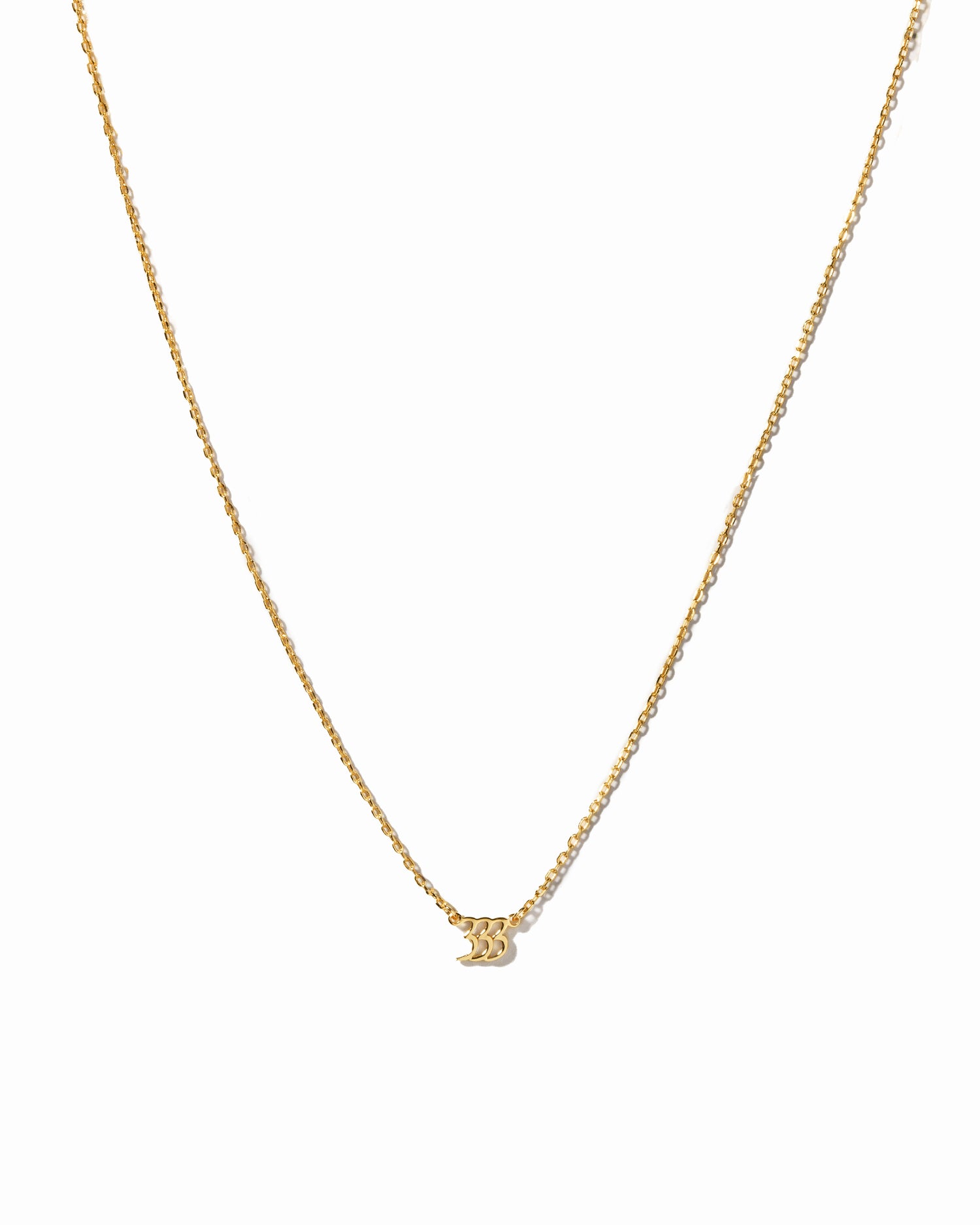 Gold angel number 333 necklace from Sami Jewels, featuring a delicate chain and a pendant with the angel number design.