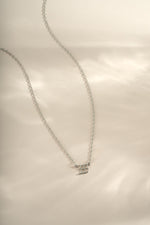 Sterling silver angel number 333 necklace by Sami Jewels, featuring a delicate pendant design on a fine chain.