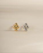 Gold and sterling silver 4-ball stud earrings by Sami Jewels, featuring minimalist round ball design on earlobes.