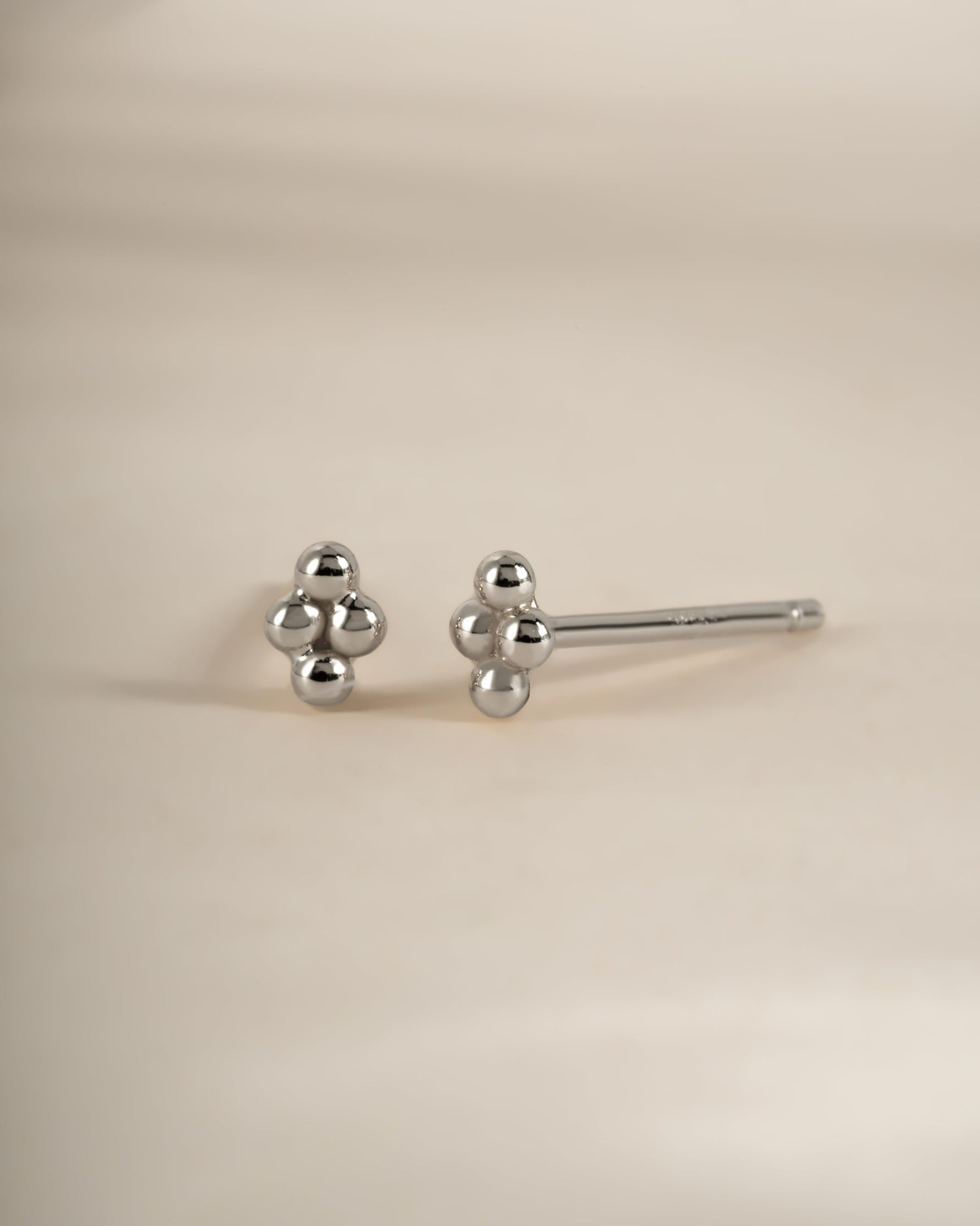 Sterling silver 4-ball stud earrings by Sami Jewels featuring minimalist round ball design for everyday wear.