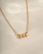 Gold angel number 444 necklace by Sami Jewels featuring a delicate pendant with the number 444, designed for elegant everyday wear.