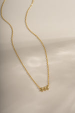 Gold Sami Jewels Angel Number Necklace with 444 pendant, featuring a delicate chain and stylish design.
