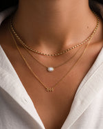 Gold angel number 444 necklace by Sami Jewels featuring a delicate chain and a pendant with the angel number design.