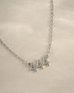 Sterling silver Angel Number 444 necklace by Sami Jewels featuring a pendant with angel number design on a delicate chain.