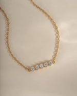 Close-up of Sami Jewels 5-stone diamond bracelet in gold, showcasing sparkling diamonds and elegant design.