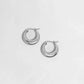 Sterling silver hoop earrings with hinge on white background