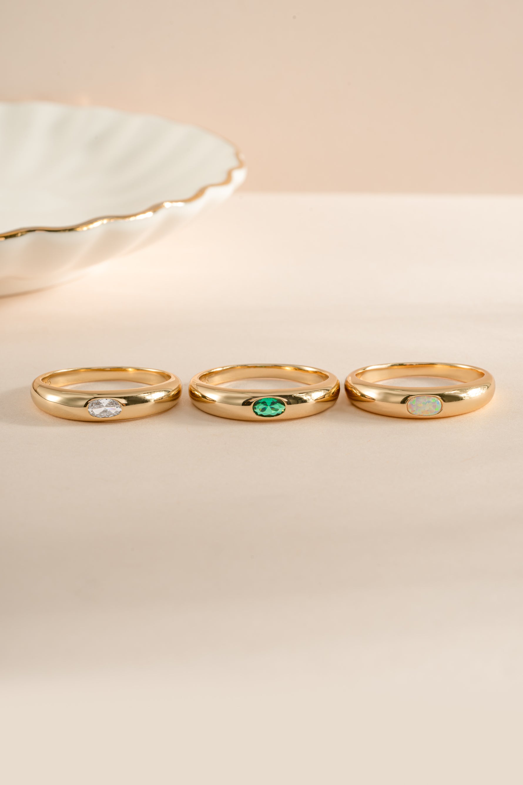 Sami Jewels opal dome ring featuring a smooth, rounded opal gemstone set in a sleek silver band.