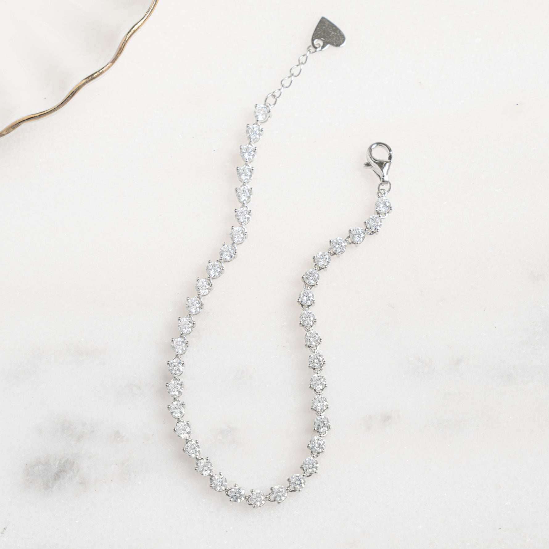 closeup image of sterling silver dainty stacking bracelet 