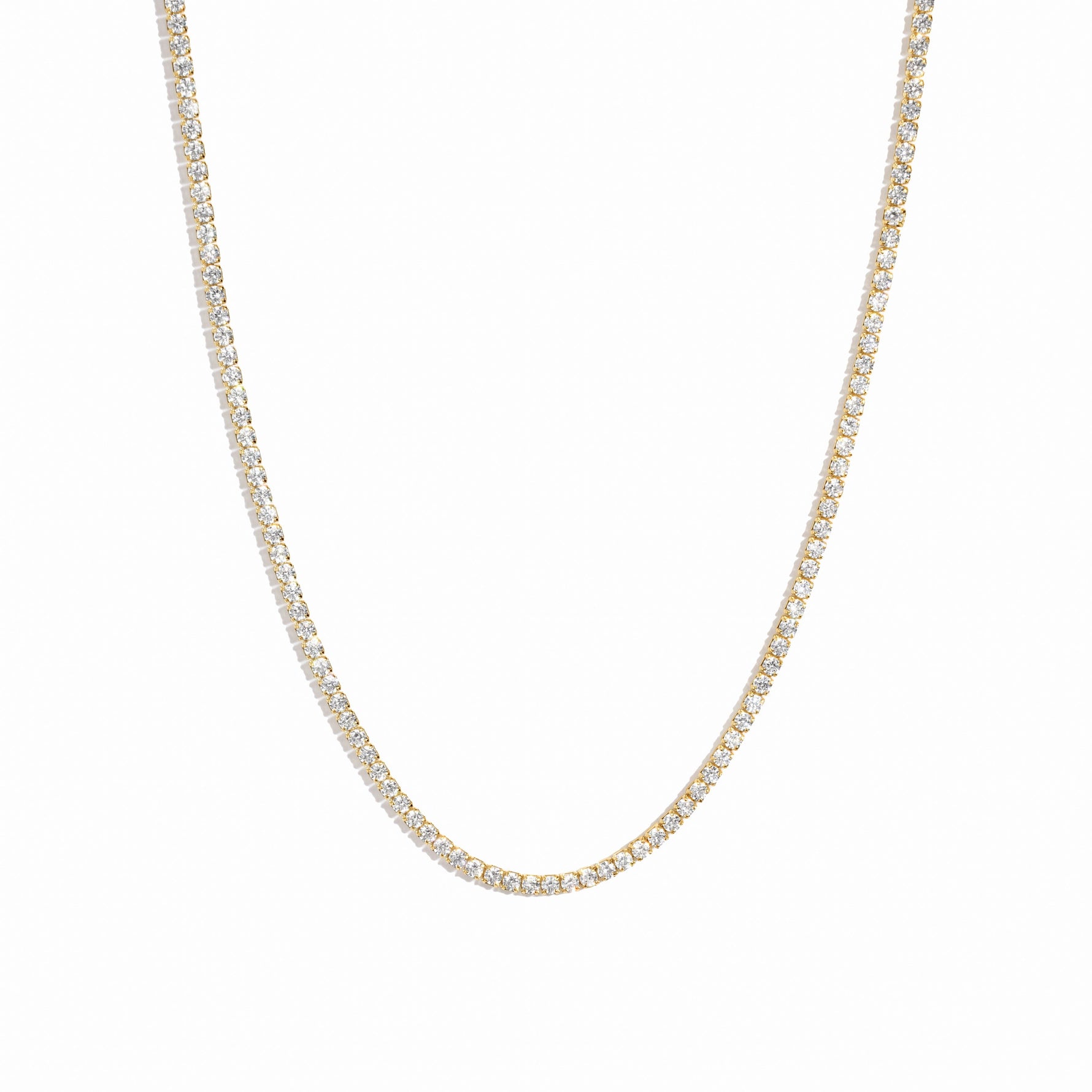 closeup image of 2mm gold tennis necklace