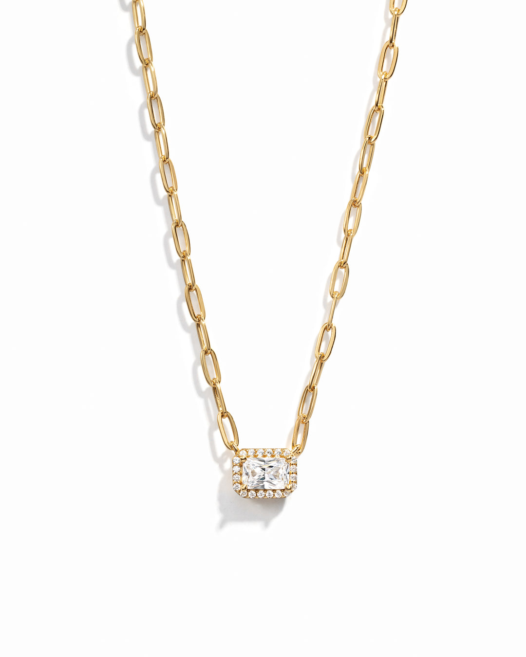 closeup image of gold pendant necklace
