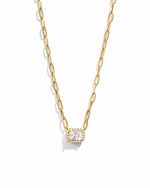 closeup image of gold pendant necklace