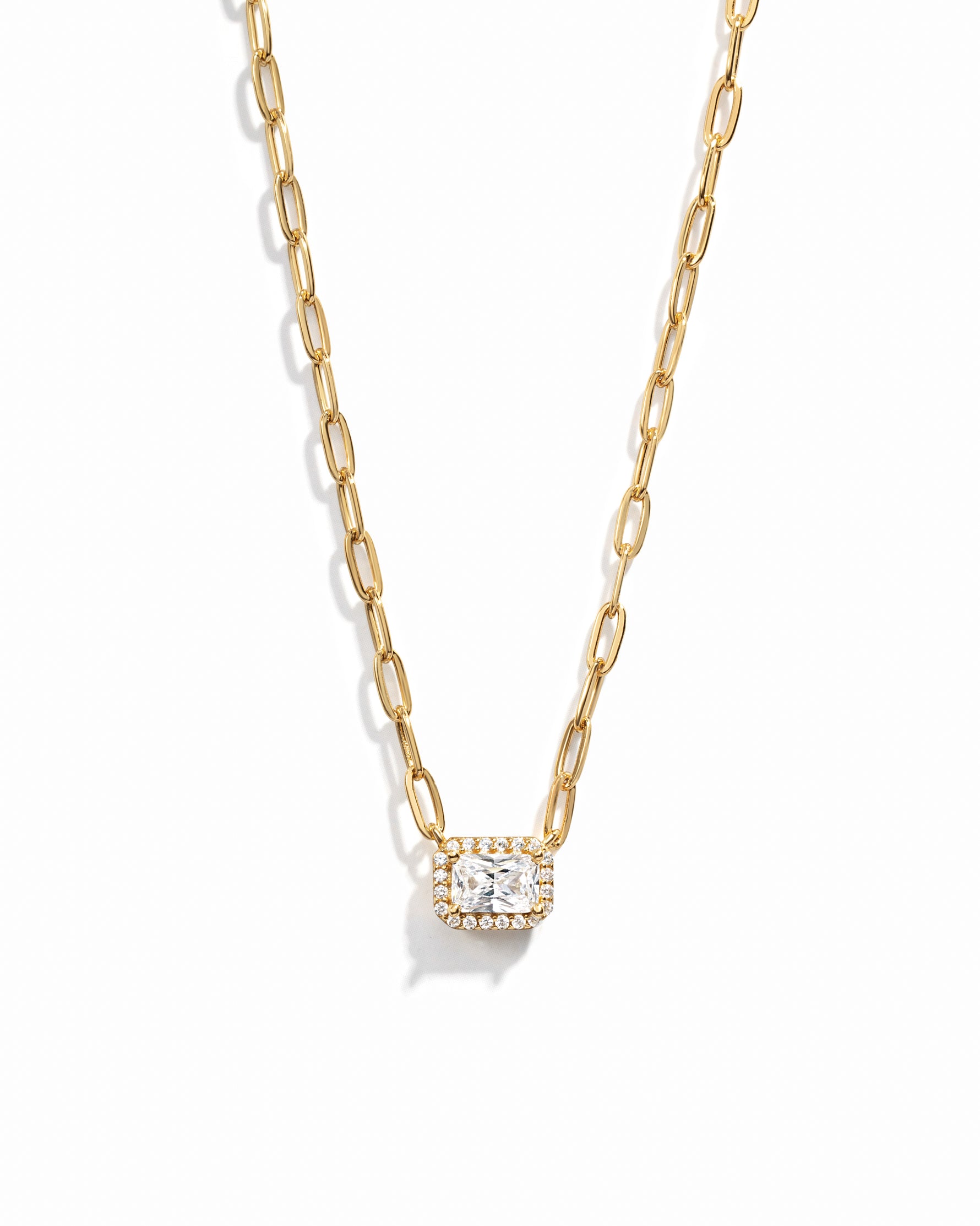closeup image of gold pendant necklace