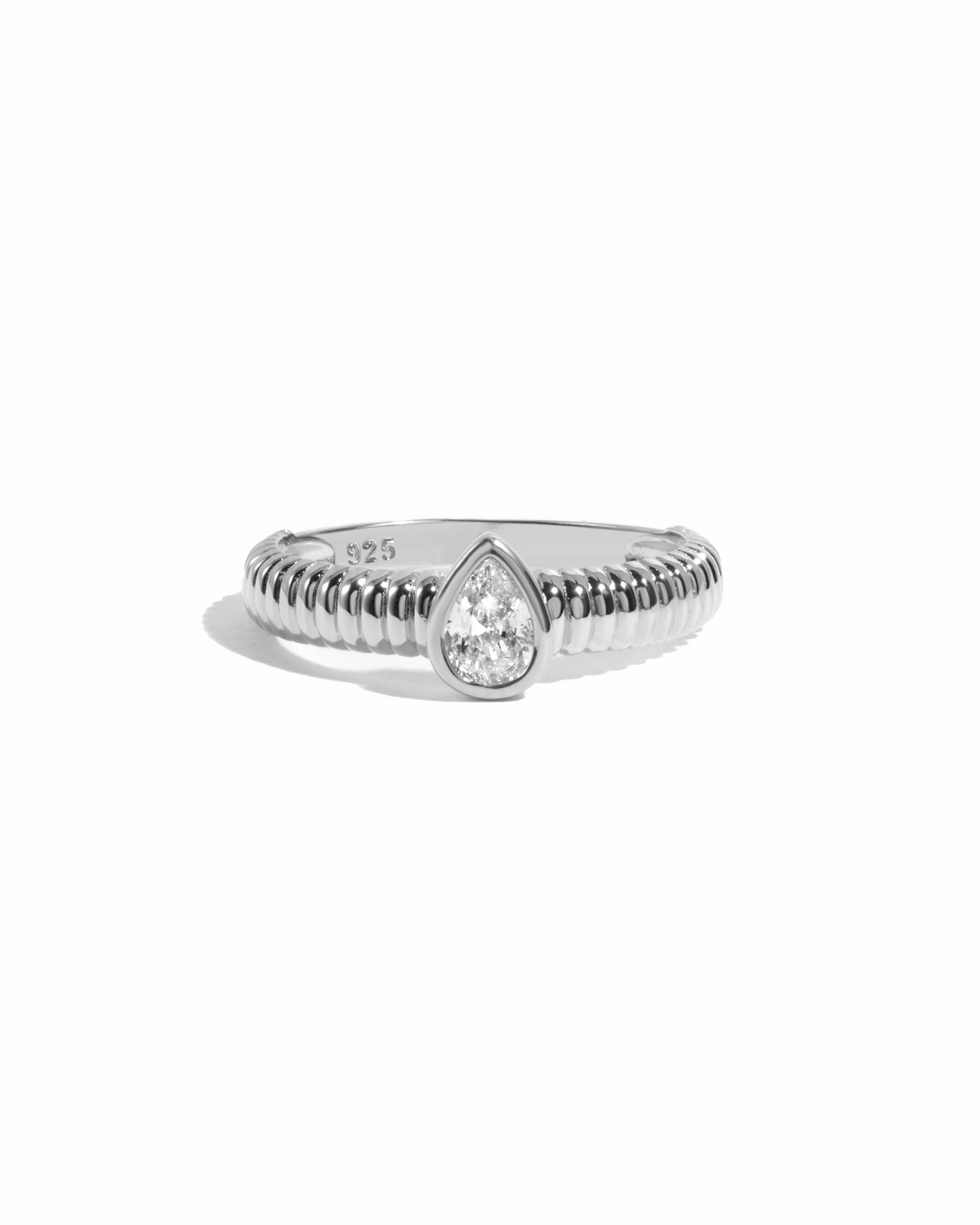 Sterling silver Pear Statement Ring by Sami Jewels featuring a pear-shaped diamond and fluted design.