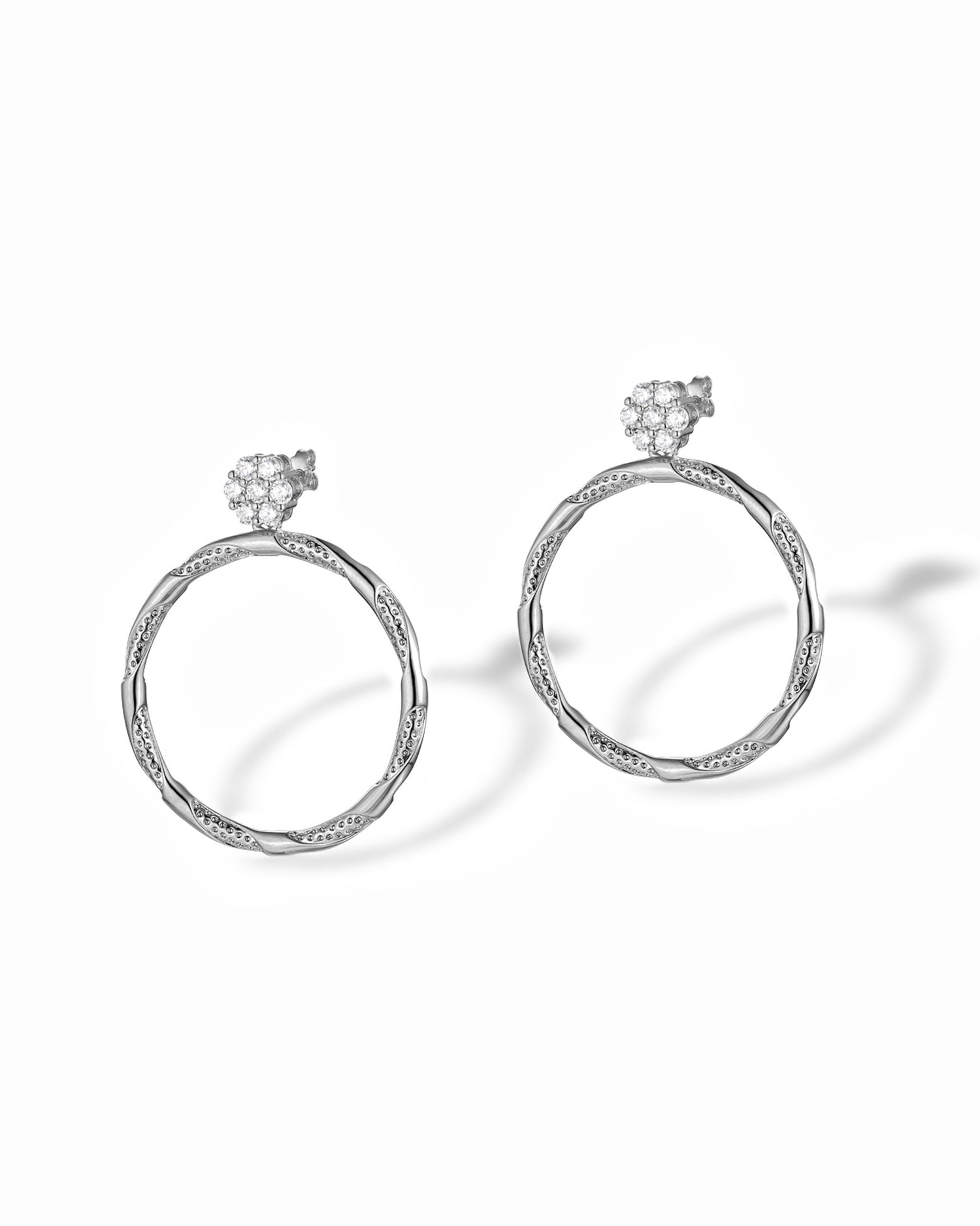 Sterling silver textured hoop earrings with diamond circle charm.