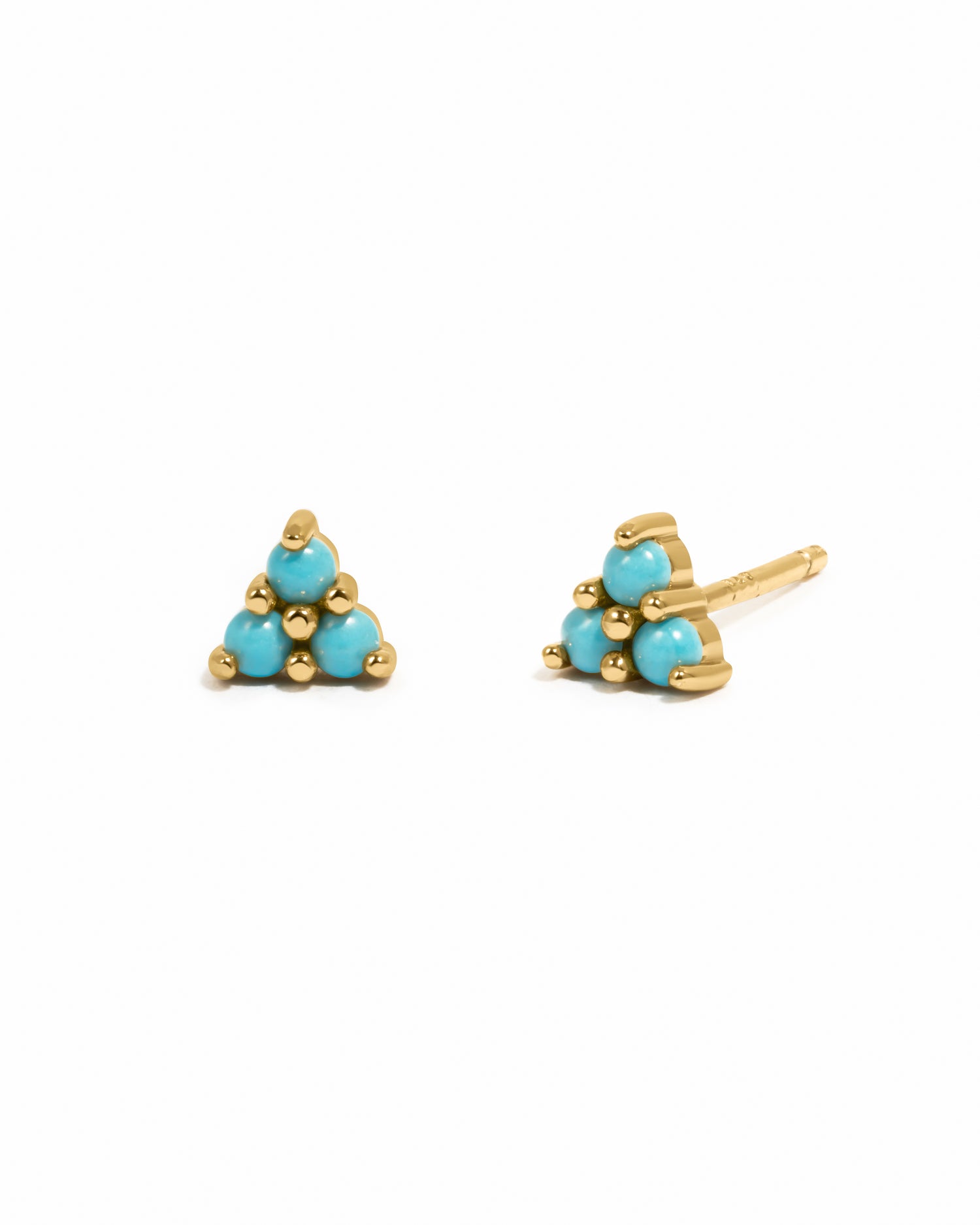 Dainty gold turquoise stud earrings.