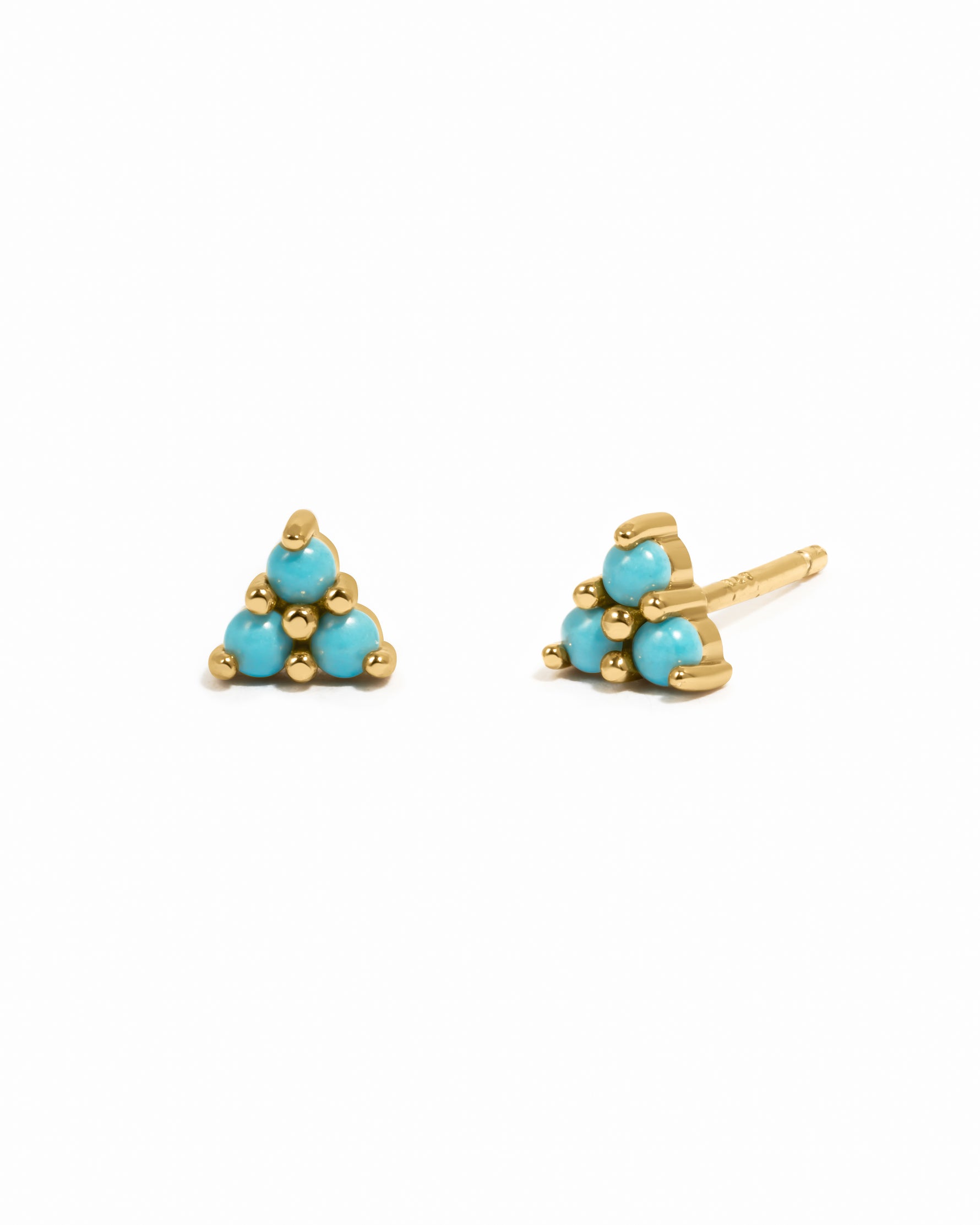 Dainty gold turquoise stud earrings.
