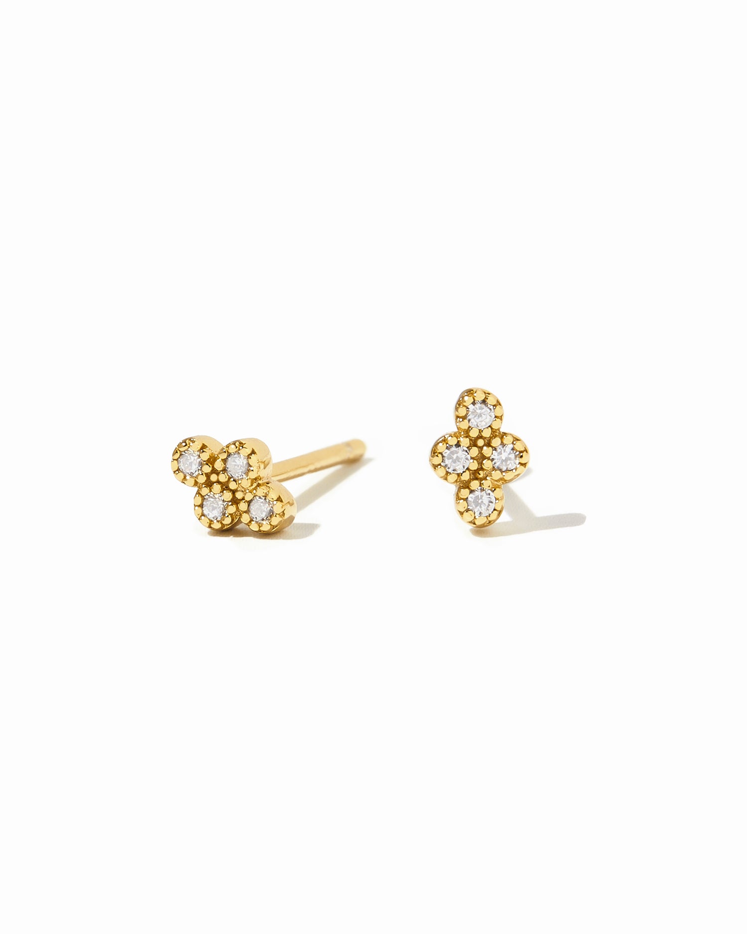 Dainty gold diamond shaped studs with 4 diamond stones. 
