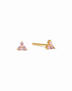 Tiny gold stud earrings with pink gemstones.