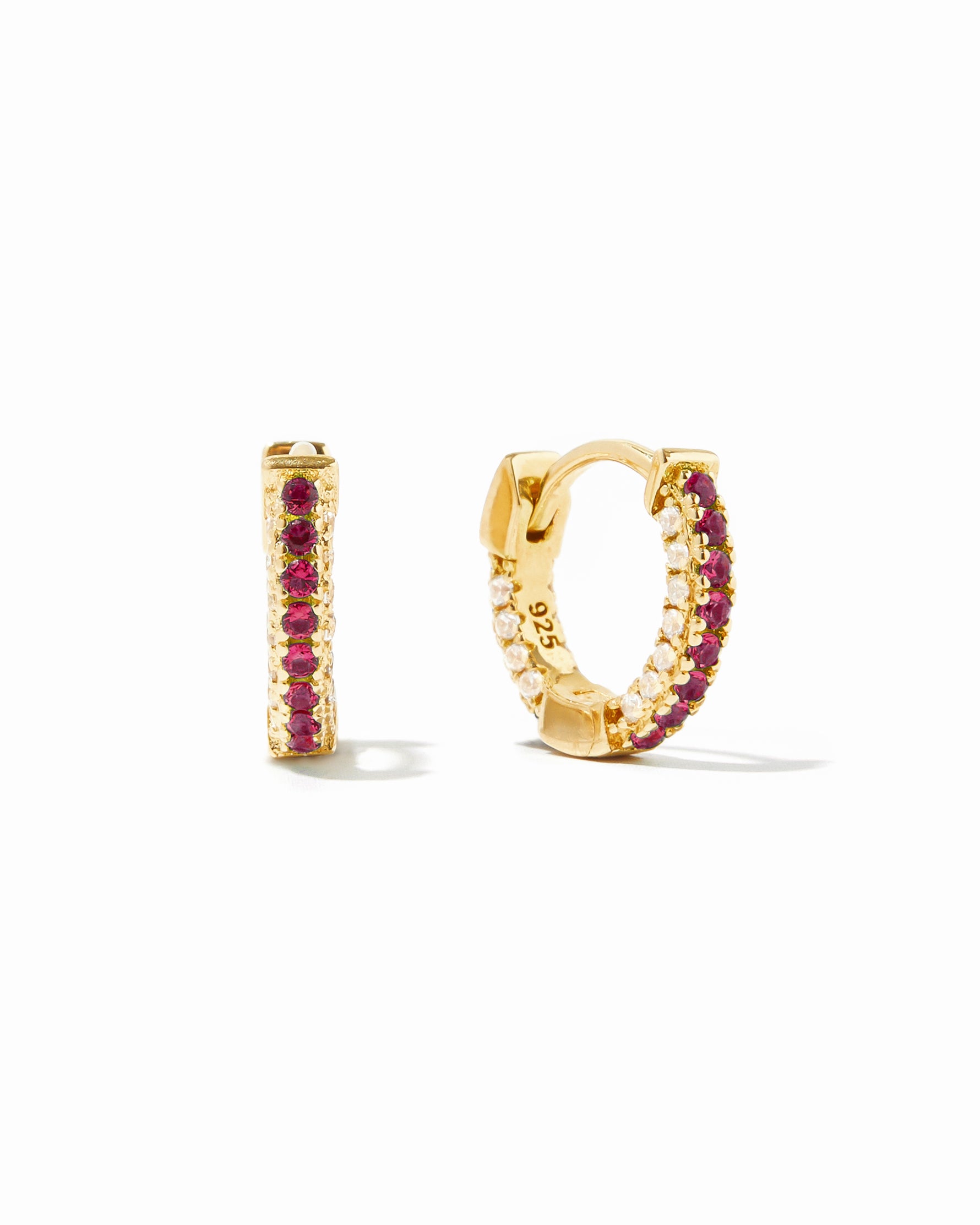 Gold pavé huggie earrings with ruby CZ's