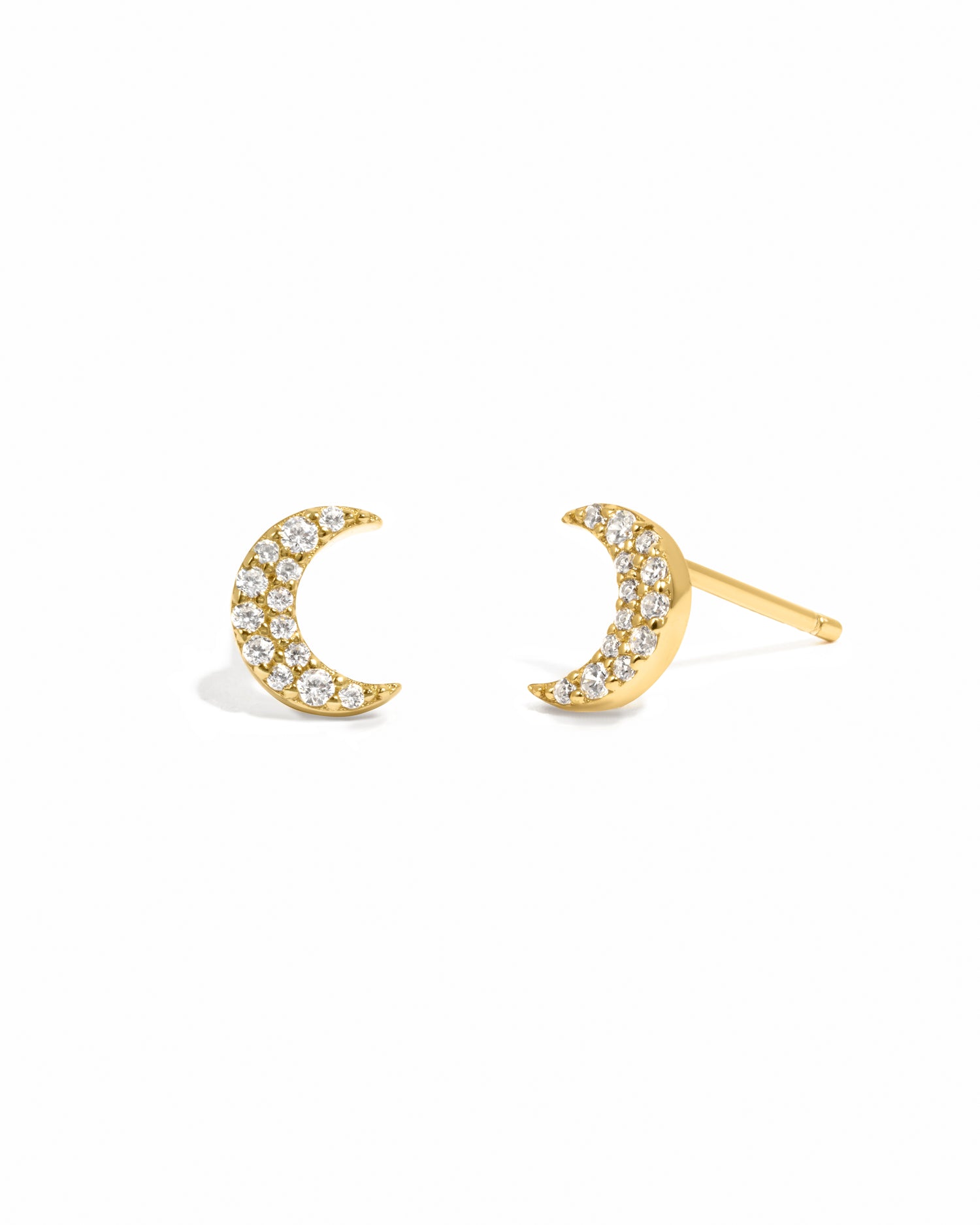Gold diamond studded moon earrings.