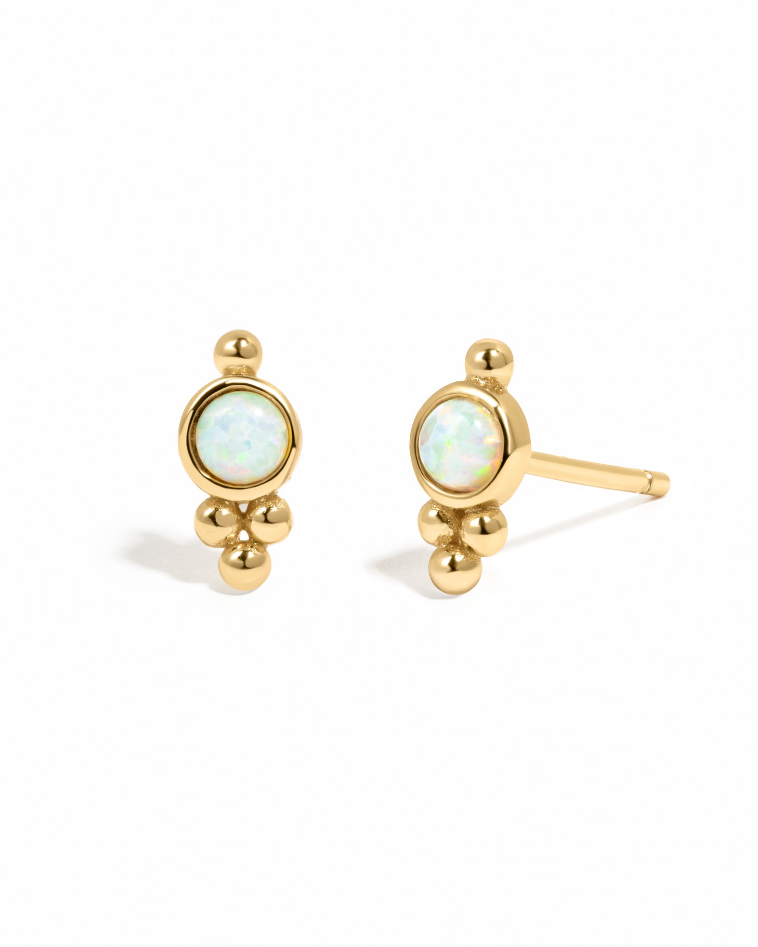 Gold beaded stud earrings with opal charm.