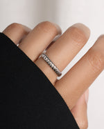 Sterling silver stacking ring on model.