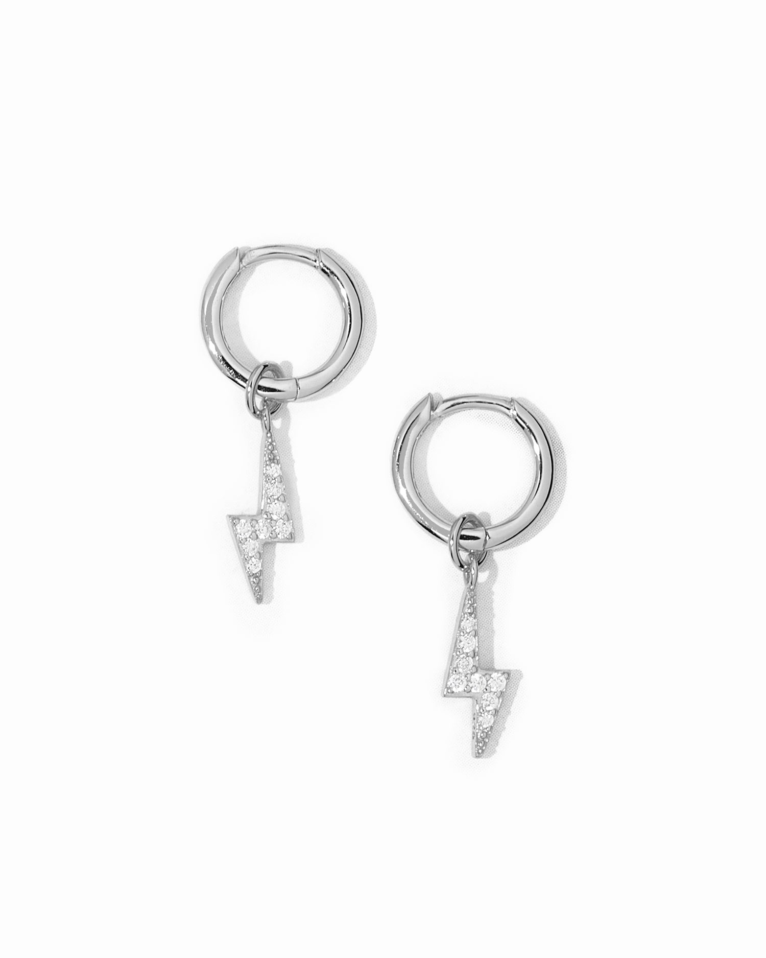 Sterling silver dainty huggies with lightning bolt charm.