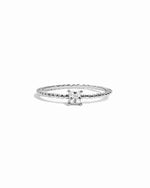 Sterling silver dainty princess cut diamond ring with beaded band.