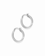 Sterling silver flat hoop earrings. 