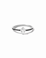 Sterling silver marquise ring with black onyx stones on band.