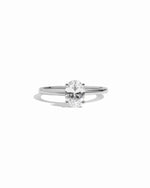 Sterling silver solitaire oval diamond engagement ring.