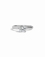 Sterling silver round solitaire diamond engagement ring.