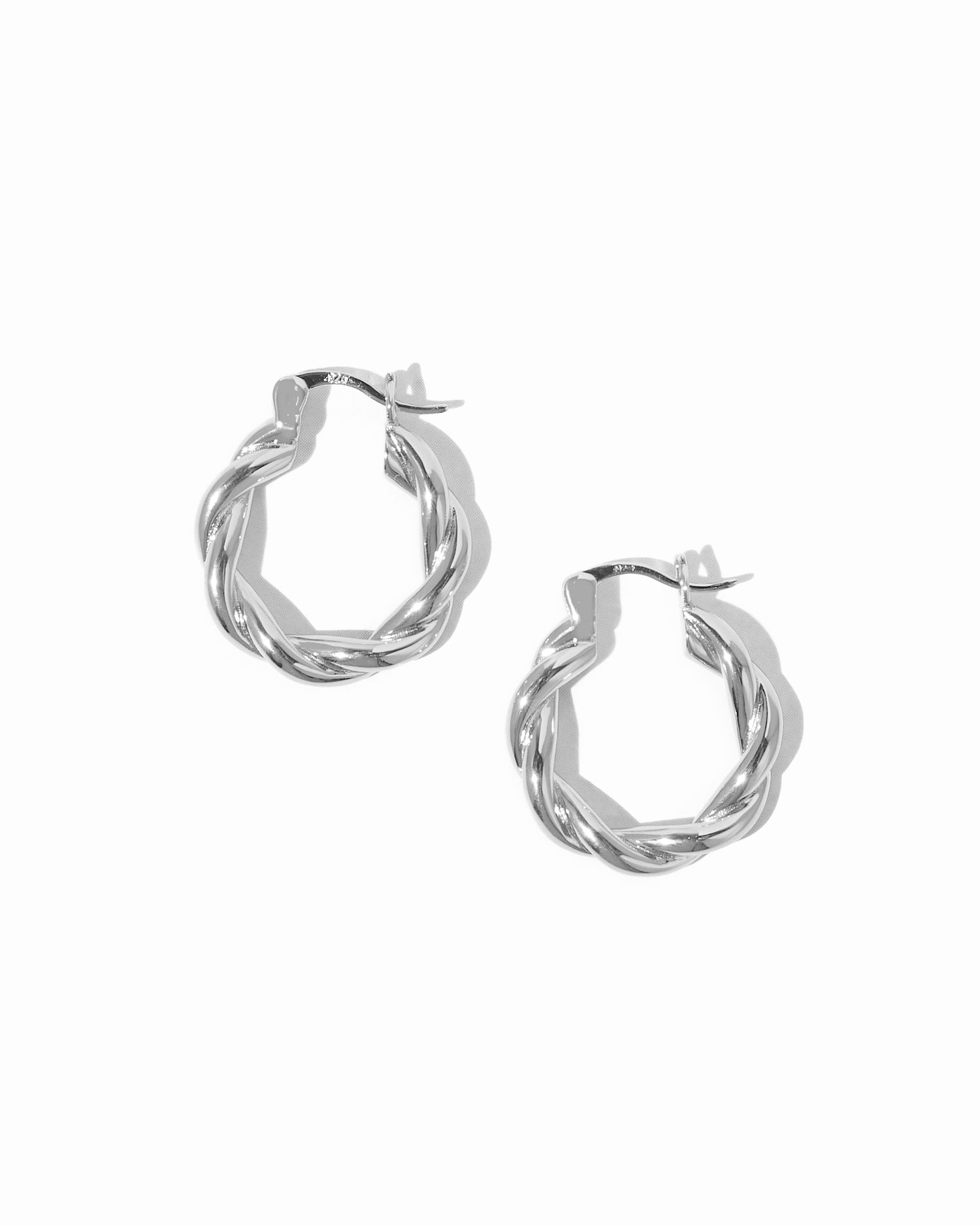 Sterling silver chunky spiral hoop earrings.
