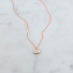 Rose gold opal evil eye pendant necklace. 