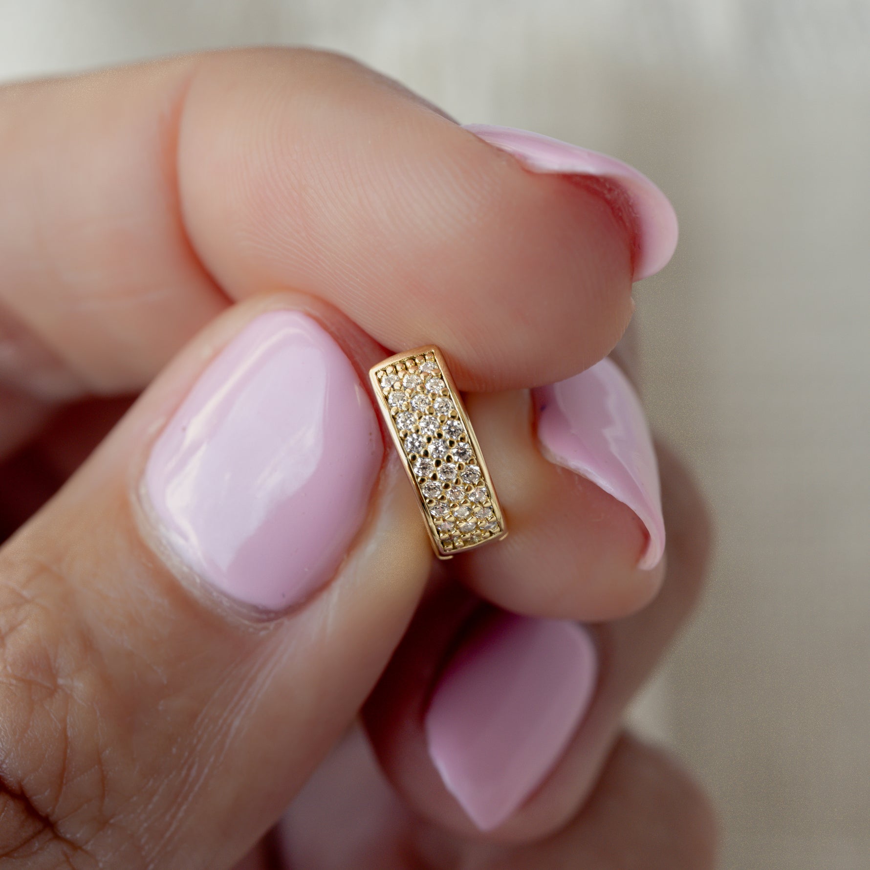 model holding pave huggies
