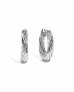 thick silver chunky hoops on white background.