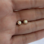 Dainty gold cz and opal sunburst halo stud earrings. 