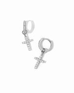 Sterling silver cz studded cross charm huggies on white background