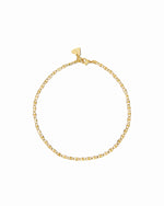 Gold chain anklet on white background