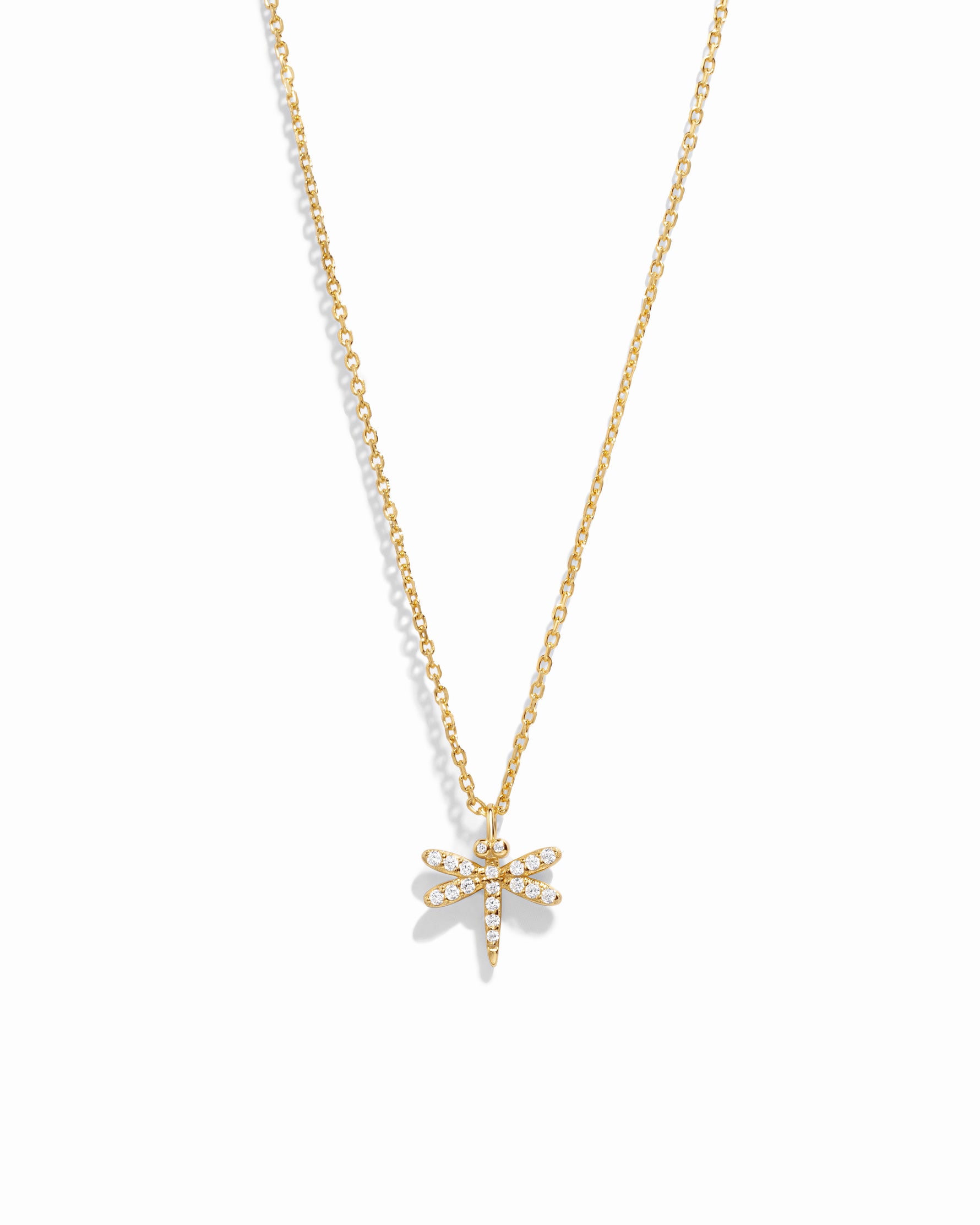 dragonfly necklace on white background
