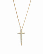 Minimalist large gold cross necklace on white background