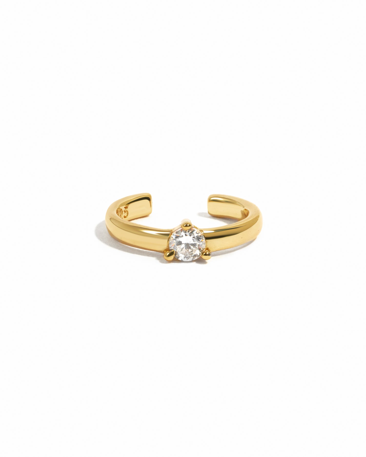 Elegant gold ear cuff with a solitaire cz stone in the center.