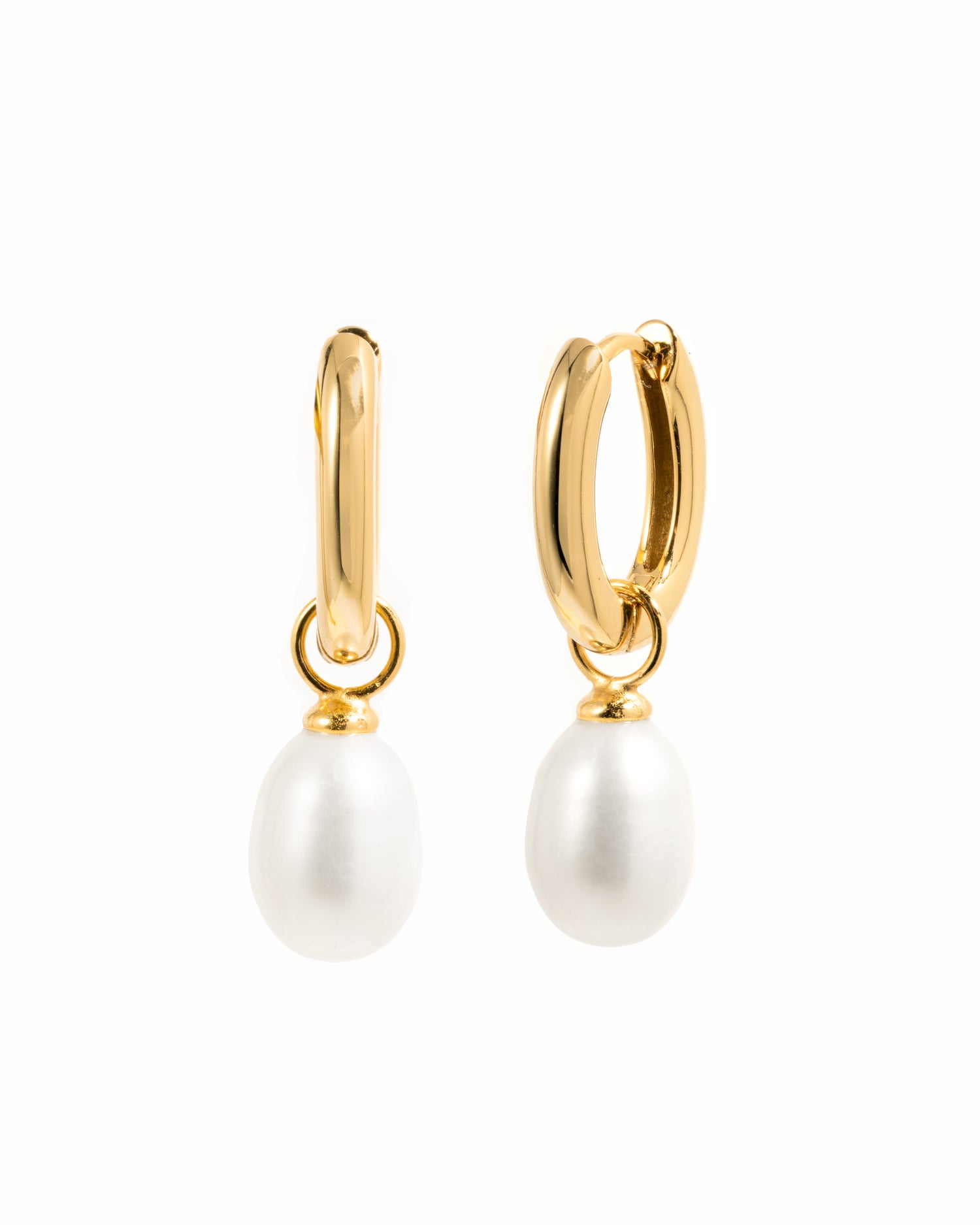 Gold hoop earrings with versatile removable pearl charms.