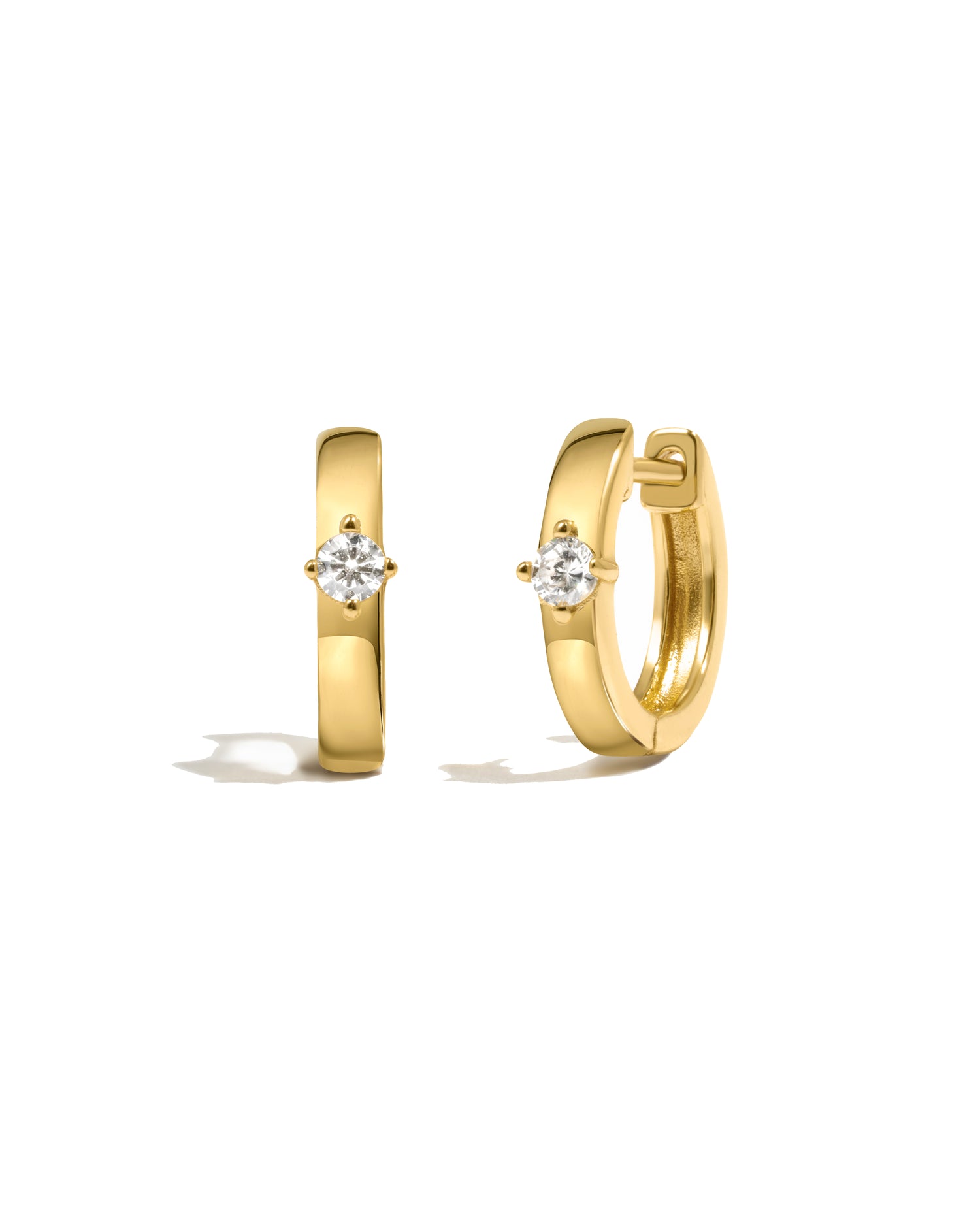 Classic gold hoop earrings with solitaire diamond