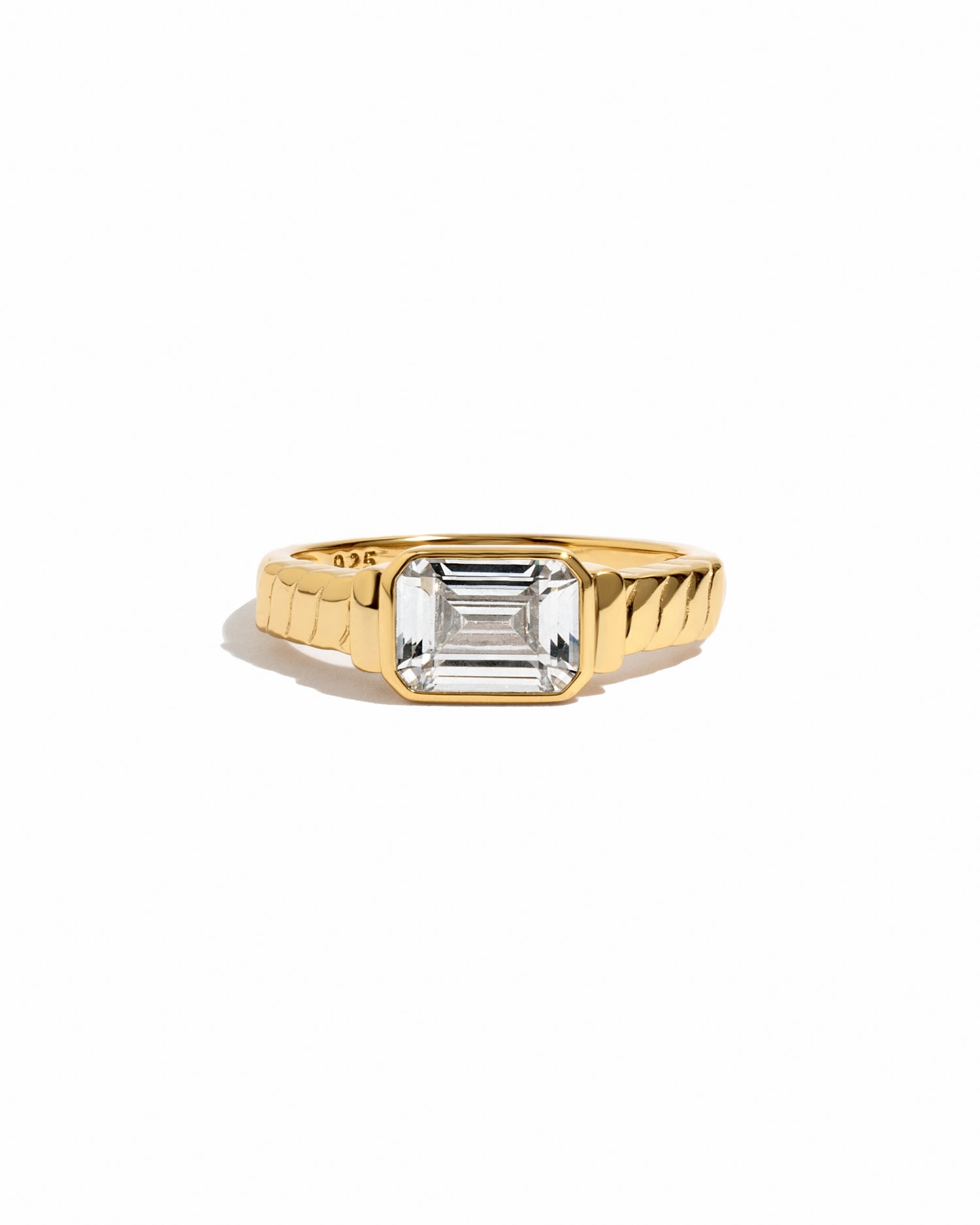 Statement diamond cz ring with textured gold band. 