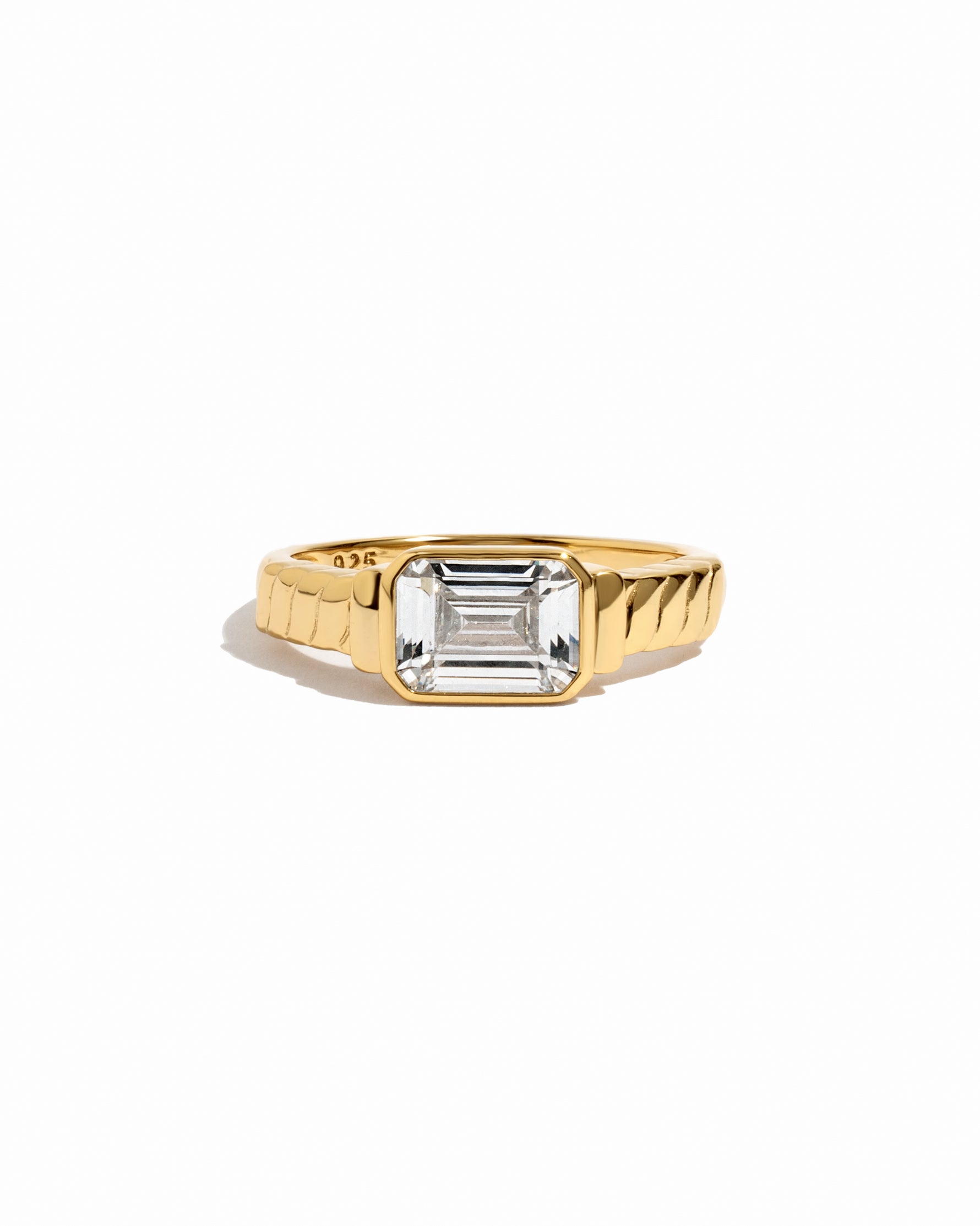 Statement diamond cz ring with textured gold band. 