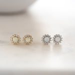Gold and silver opal sunburst cz stud earrings. 
