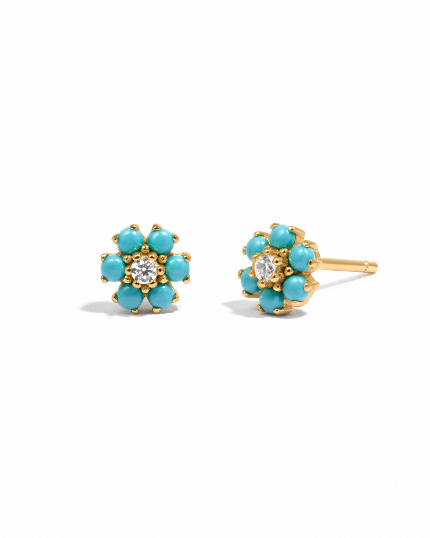 Gold turquoise flower stud earrings with cz stone center. 